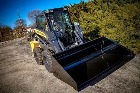 how to change attachments on a new holland skid steer|new holland mini excavator attachments.